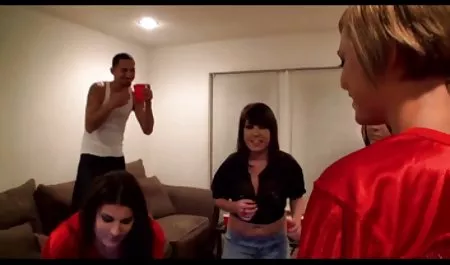 A young girl holds a camera in her hands and shoots sex with a guy